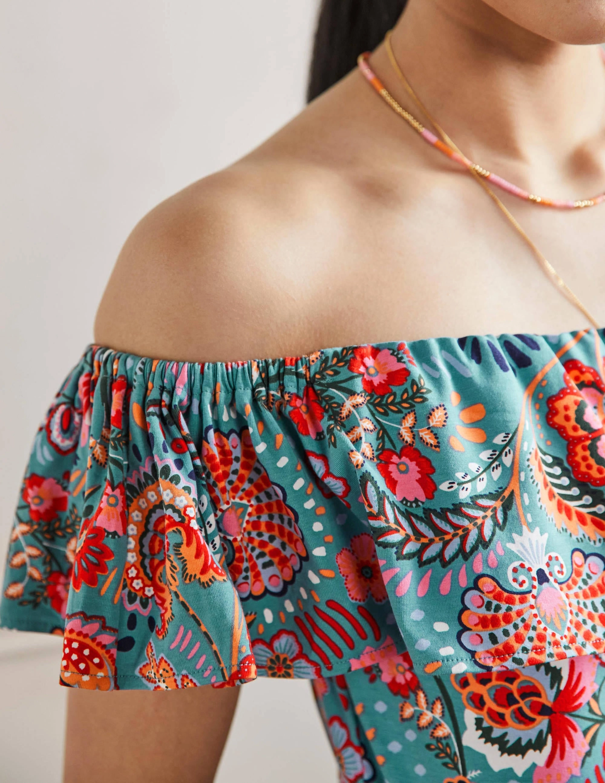 Ruffle Neck Jersey Playsuit-Larkspur. Decorative Meadow